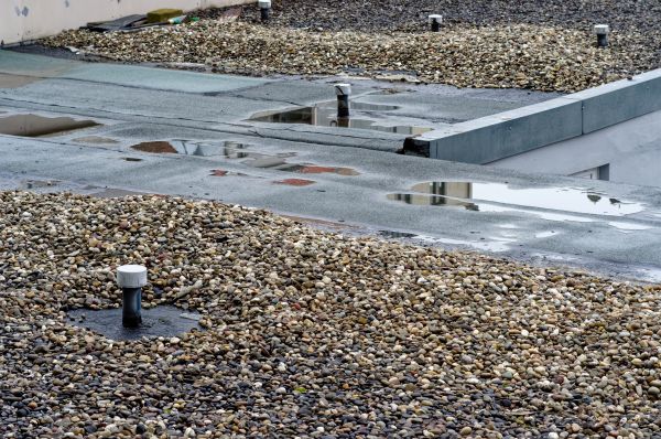 Tar And Gravel Roof Repair in Glastonbury